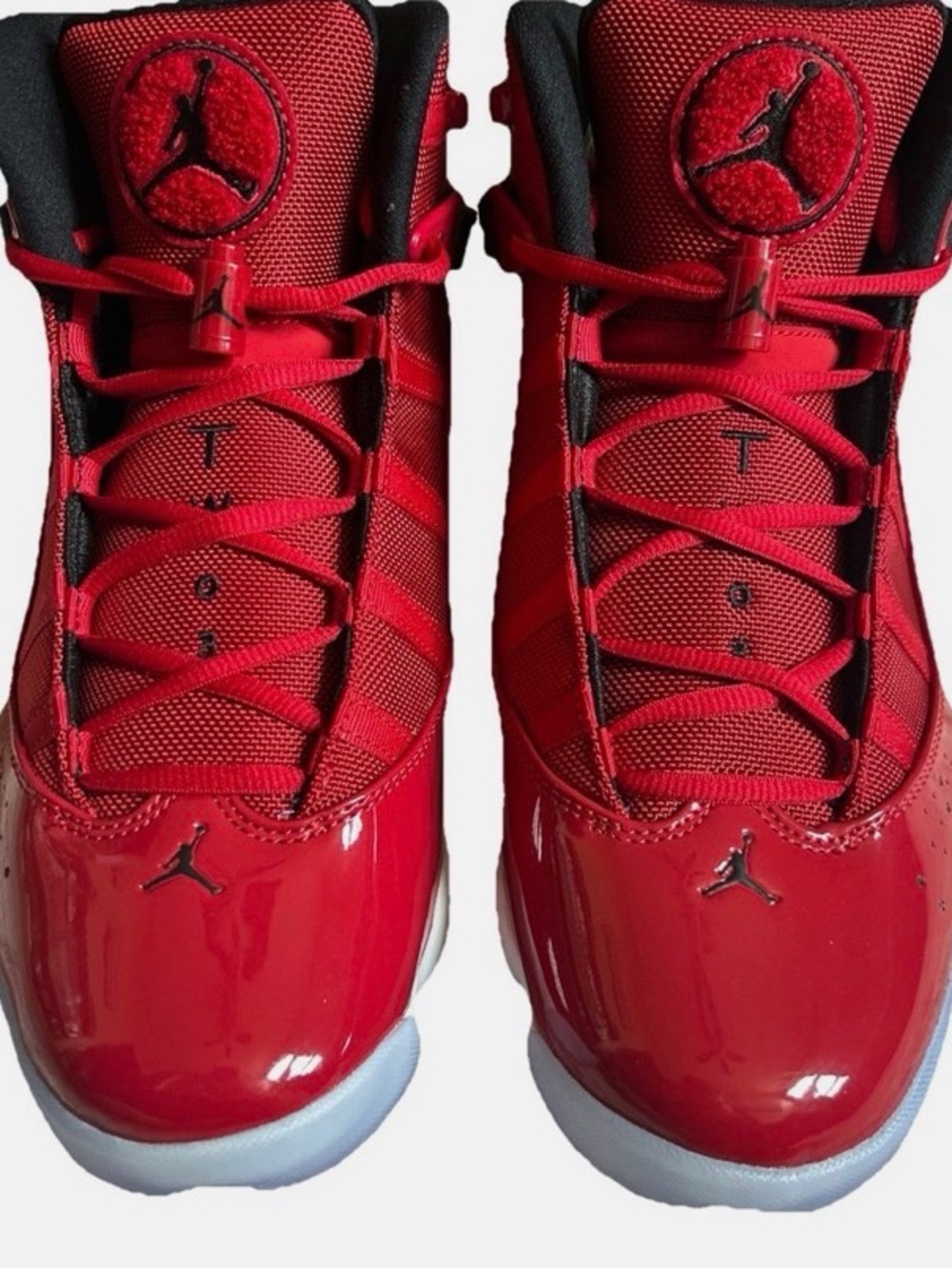 Jordan’s men’s  Red High-Top Retro Basketball Sneakers